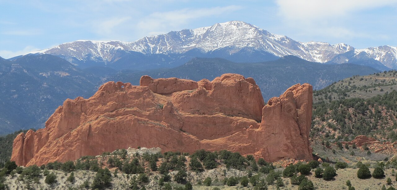 Garden of the Gods red rock formations with Pikes Peak rising in the background